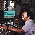the album cover for Phillip Smart / The Aggrovators - At King Tubby's