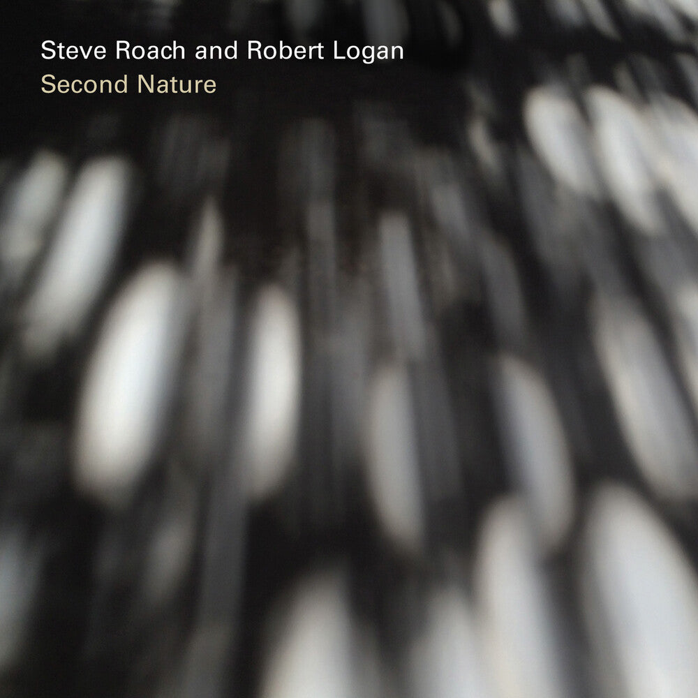 the album cover for Steve Roach / Logan,Robert - Second Nature