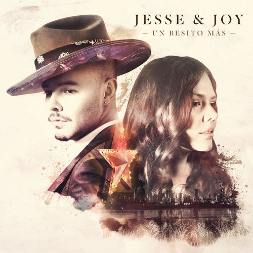 the album cover for Jesse & Joy - Un Besito Mas