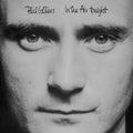 the album cover for Phil Collins - In The Air Tonight (packaged with a comic book)