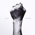 the album cover for Savages - Adore Life
