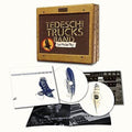 the album cover for Tedeschi Trucks Band - Let Me Get By [2CD Deluxe Edition Box Set]