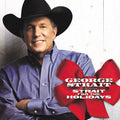 the album cover for George Strait - Strait For The Holiday