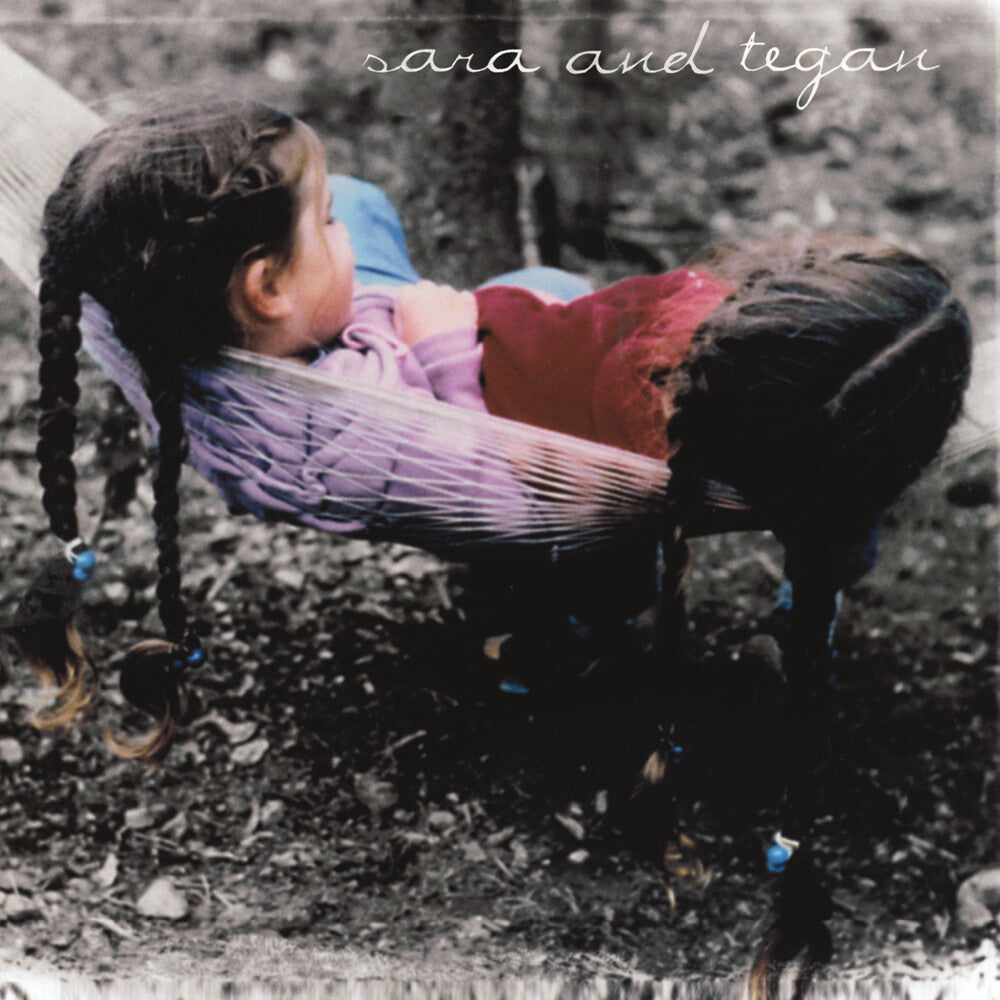 the album cover for Tegan and Sara - Under Feet Like Ours