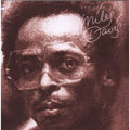 the album cover for Miles Davis - Get Up With It