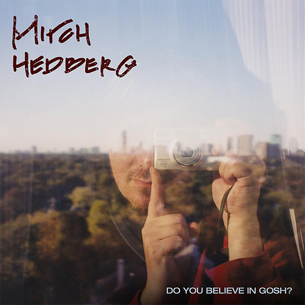 the album cover for Mitch Hedberg - Do You Believe In Gosh
