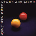 the album cover for Paul McCartney - Venus And Mars [Indie Exclusive Limited Edition Red/Yellow LP]