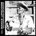 the album cover for Mance Lipscomb - Texas Sharecropper & Songster [Colored Vinyl] (Grn)