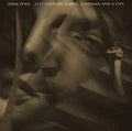 the album cover for John Foxx - 21st Century: A Man - a Woman and a City