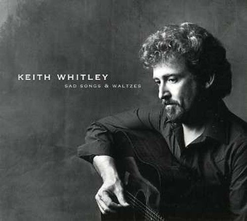 the album cover for Keith Whitley - Sad Songs and Waltzes