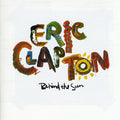 the album cover for Eric Clapton - Behind the Sun