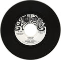 the album cover for Durand Jones & The Indications - Smile / Tuck 'n' Roll [Vinyl Single]