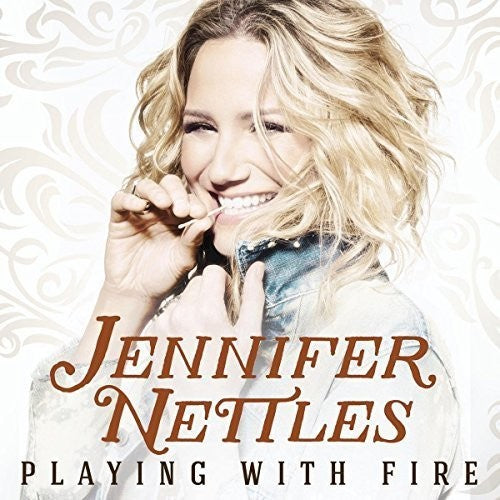 the album cover for Jennifer Nettles - Playing With Fire