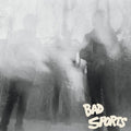 the album cover for Bad Sports - Living with Secrets