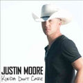 the album cover for Justin Moore - Kinda Don't Care