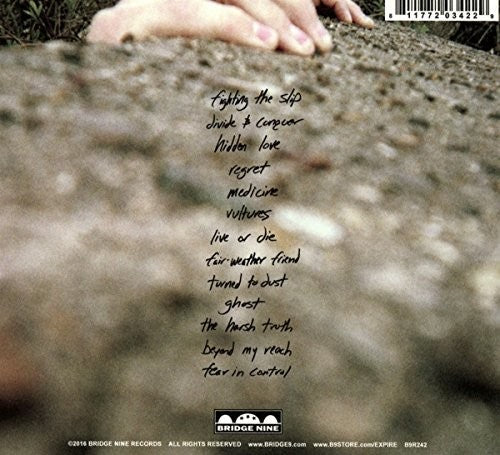 the album cover for Expire - With Regret
