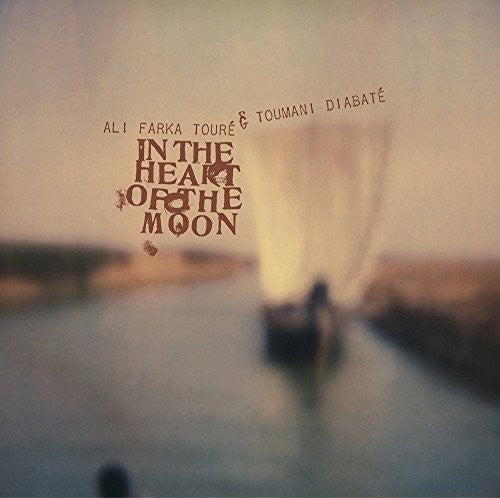the album cover for Ali Toure Farka / Diabate,Toumani - In The Heart Of The Moon