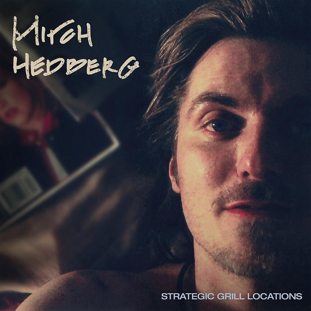 the album cover for Mitch Hedberg - Strategic Grill Locations