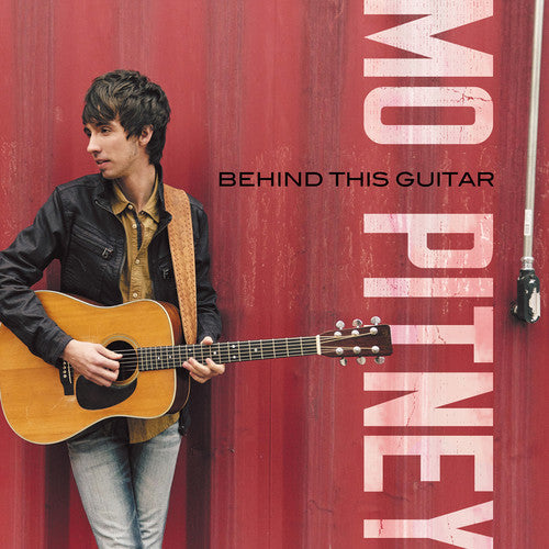 the album cover for Mo Pitney - Behind This Guitar