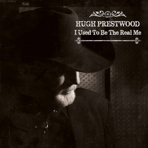 the album cover for Hugh Prestwood - I Used To Be The Real Me