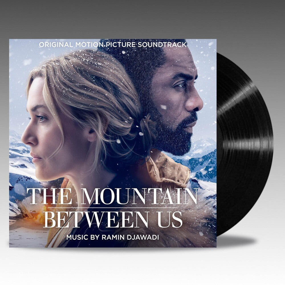 the album cover for The Mountain Between Us [Movie] - The Mountain Between Us [Soundtrack LP]