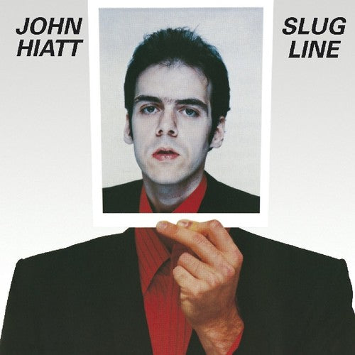 the album cover for John Hiatt - Slug Line