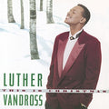 the album cover for Luther Vandross - This Is Christmas