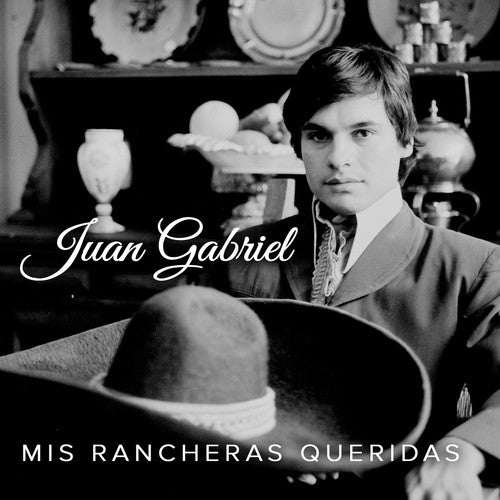 the album cover for Juan Gabriel - Mis Rancheras Queridas