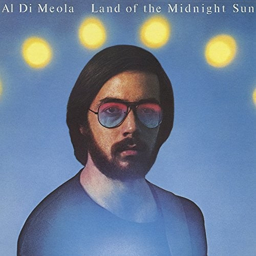 the album cover for Al Di Meola - Land Of The Midnight Sun