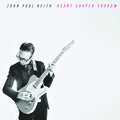 the album cover for John Keith Paul - Heart Shaped Shadow