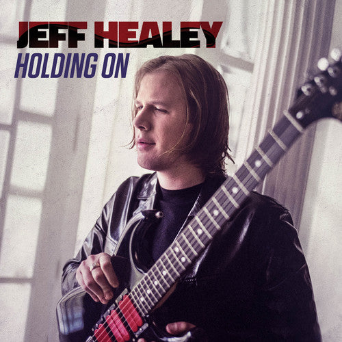 the album cover for Jeff Healey - Holding On