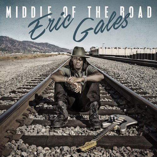 the album cover for Eric Gales - Middle Of The Road