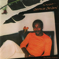the album cover for George Benson - In Flight [Deluxe]