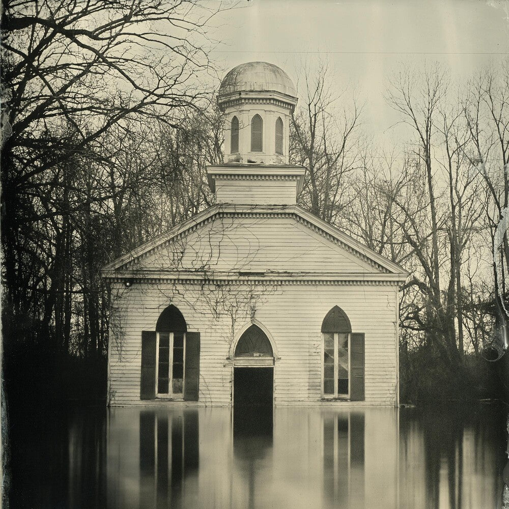 the album cover for Lucero - Among The Ghosts