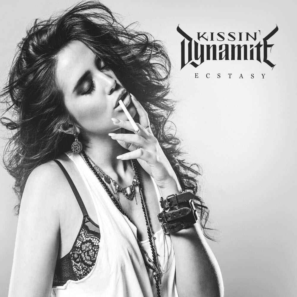 the album cover for Kissin' Dynamite - Ecstasy