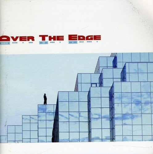 the album cover for Mickey Thomas - Over The Edge