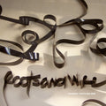 the album cover for Deadbeat - Roots & Wire