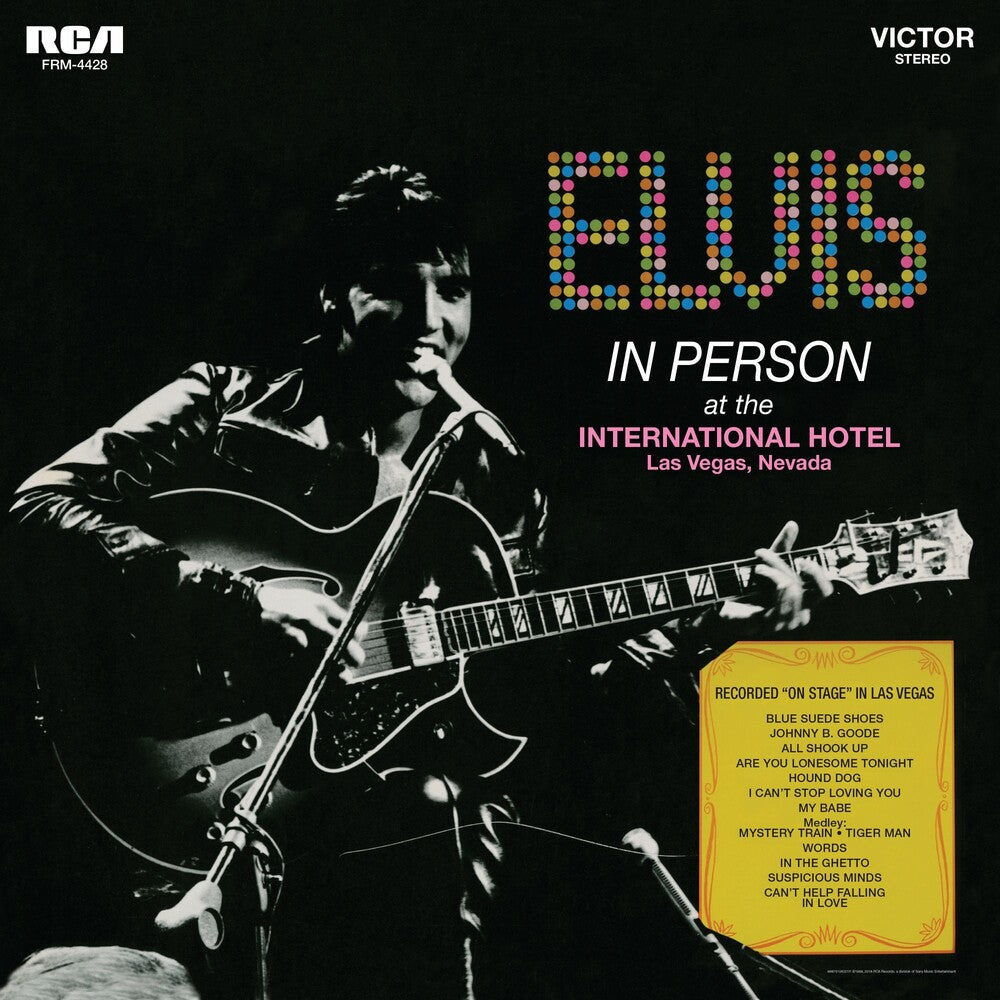 the album cover for Elvis Presley - In Person At The International Hotel Las Vegas Nevada [Audiophile Translucent Gold & Blue Swirl LP]