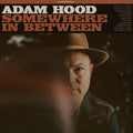 the album cover for Adam Hood - Somewhere In Between [LP]