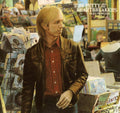 the album cover for Tom Petty & The Heartbreakers - Hard Promises