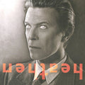the album cover for David Bowie - Heathen [Platinum and Orange Swirl Limited Anniversary Edition LP]