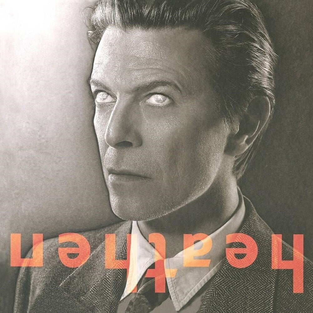 the album cover for David Bowie - Heathen [Platinum and Orange Swirl Limited Anniversary Edition LP]