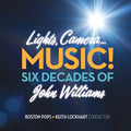 the album cover for Boston Pops Orchestra - Lights Camera Music Six Decades Of John Williams