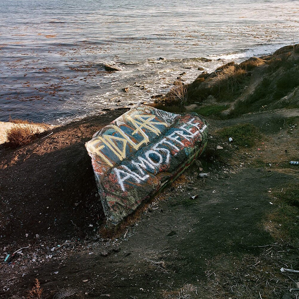 the album cover for FIDLAR - Almost Free [Indie Exclusive Limited Edition Green LP]