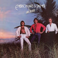 the album cover for Emerson, Lake & Palmer - Love Beach