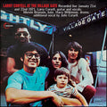 the album cover for Larry Coryell - At The Village Gate