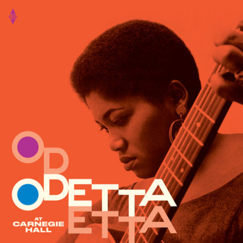 the album cover for Odetta - At Carnegie Hall + 2 Bonus Tracks