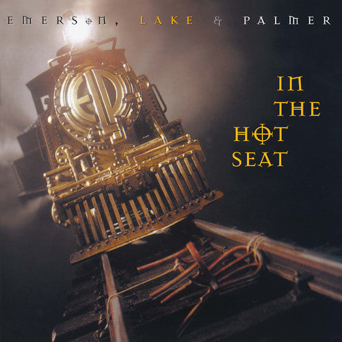 the album cover for Emerson, Lake & Palmer - In The Hot Seat