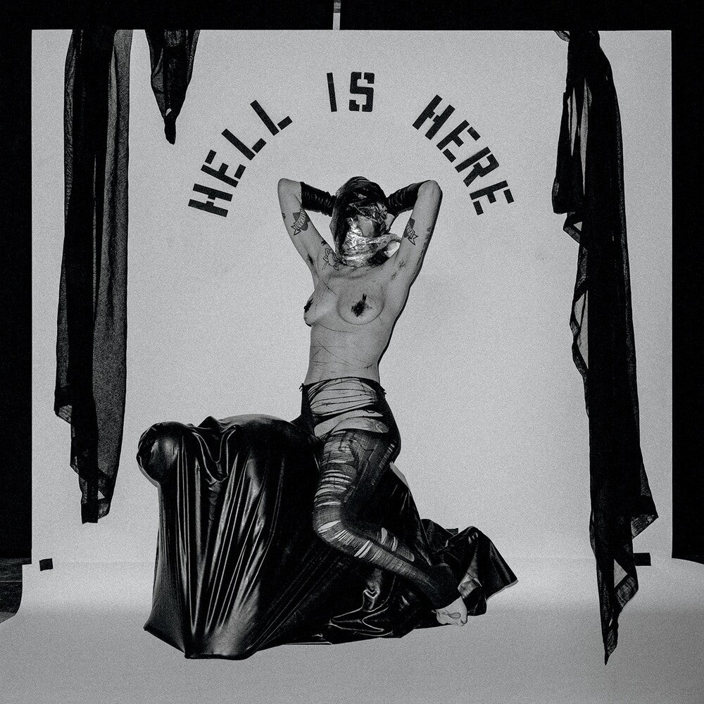 the album cover for Hide - Hell Is Here (Indie Exclusive) (Blk) [Clear Vinyl] [Indie Exclusive]