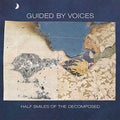 the album cover for Guided By Voices - Half Smiles Of The Decomposed [Red LP]